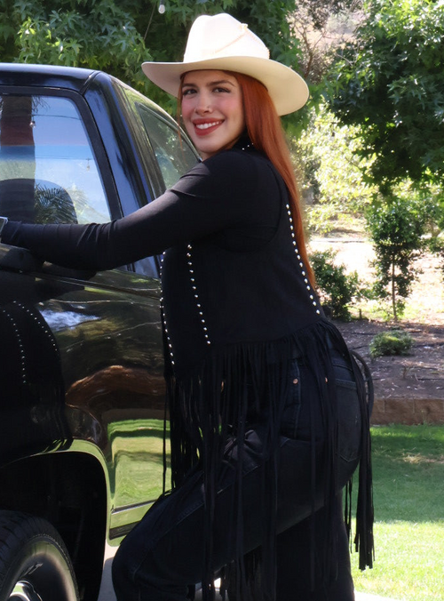Black western-style fringed vest with studs